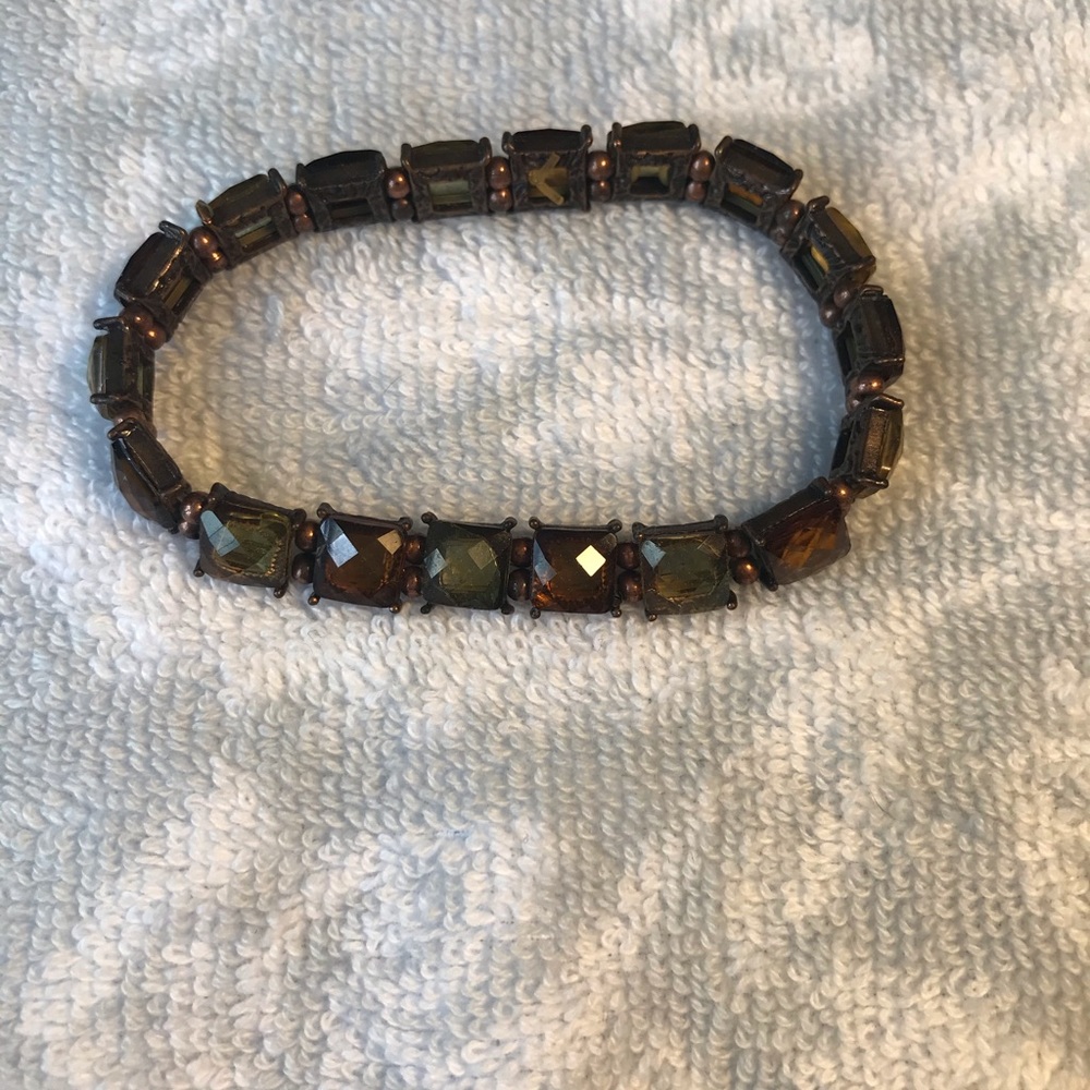 Green and brown bracelet.